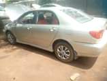 A picture of Toyota Corolla 2003 engine smoking