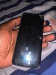 A picture of S8 price 170k got problem with screen storage 128 0709766746