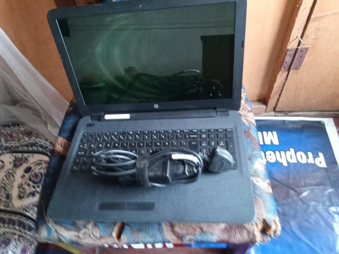 A picture of Grade one fairly used HP Slim Laptop