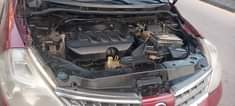 A picture of Nissan Tilda 2010 engine gear and ac100 price 2 4m