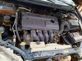 A picture of Toyota Corolla LE Tok standard first body year 2004 nothing