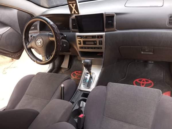 A picture of Toyota Corolla Obama pimped sport with flying doors located in