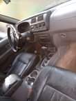 A picture of Nissan Frontier Auxilary gear Smoking Engine 900k owner 80k sambo