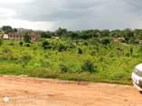 A picture of Plot on sale 3 1m located at matugga migadde behind