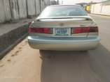 A picture of Very sharp silver color 2002 Toyota Camry droplite Engine gear
