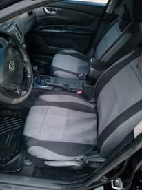 A picture of 2009 kia optima 4 plugs