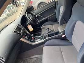 A picture of Subaru legacy turbo 2006 model UBG black color with grew