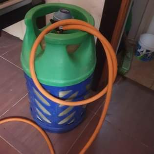 A picture of Gas cylinder with gas pipes 380.watsapp 66293656