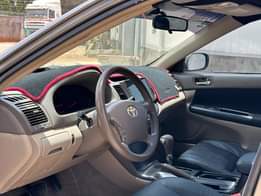 A picture of USED TOYOTA CAMRY LE 2004 MODEL UNREGISTERED WITH SMALL TOP