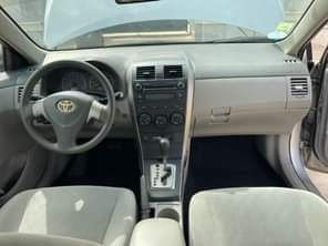 A picture of SLIGHTLY USED TOYOTA COROLLA LE MODEL 2010 WITH DUTY 5
