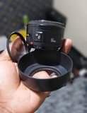 A picture of Lens 50mm plastic f1.8 Canon Hood Filter 220 000