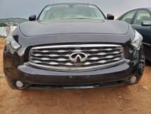 A picture of Distress Toks Standard 2011 Infiniti FX35 buy and drive Untampered