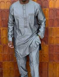 A picture of Fully Suit Available All sizes Check me Whatsapp 255 757556389