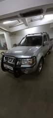 A picture of NISSAN DOUBLE CABIN 33 000 000 2009 MODEL PERFECT CONDITION
