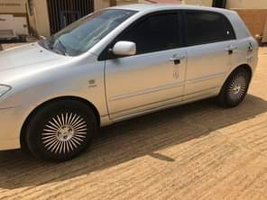 A picture of Toyota Corolla obama few months used with original duty 1
