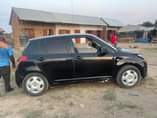 A picture of Suzuki swift new model Engine safi sana Gearbox safi Bei