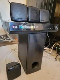 A picture of LG hometheater and vyom tv 24 inches digital