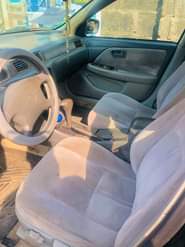 A picture of Toyota Camry tiny light Engine ok Gear ok Body needs