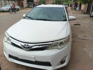 A picture of Distress foreign used 2013 Camry in pristine condition Going for