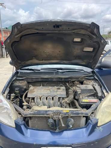 A picture of BRIEFLY USED 2004 TOYOTA MATRIX CAR CAME IN LATE 2021