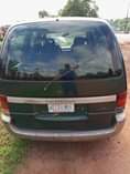A picture of Nissan Serena bus first body first paint with untampered engine