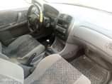 A picture of Mazda 323 neatly