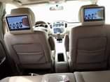 A picture of Car Android screen reverse camera headrest DVD tracker speakers and