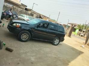 A picture of Honda Pilot 2004 Painted Sound engine and gear AC 1