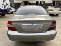 A picture of Registered Toyota Camry 2004 Model Interior Clean remote entry painted
