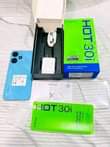 A picture of Infinix hot 30i gb 128 ram 8 mpyaa full boksi