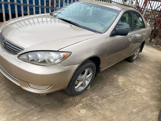 A picture of 2005 Nigeria used Toyota Camry Gold color 4Plug Buy and