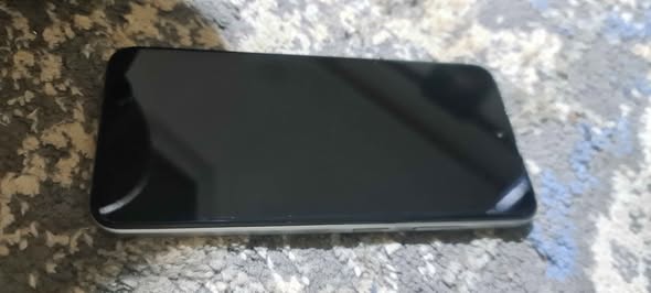 A picture of Quick specs Infinix smart 9 128gb ROM Side fingerprint sensor