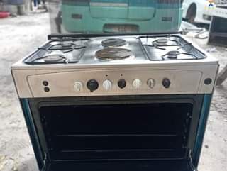A picture of NAUZA JIKO LA PLATE6 PLATE2 ZINATUMIA UMEME PLATE4 ZINATUMIA GESI