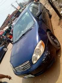 A picture of Toyota Corolla LE Tok standard first body year 2004 nothing