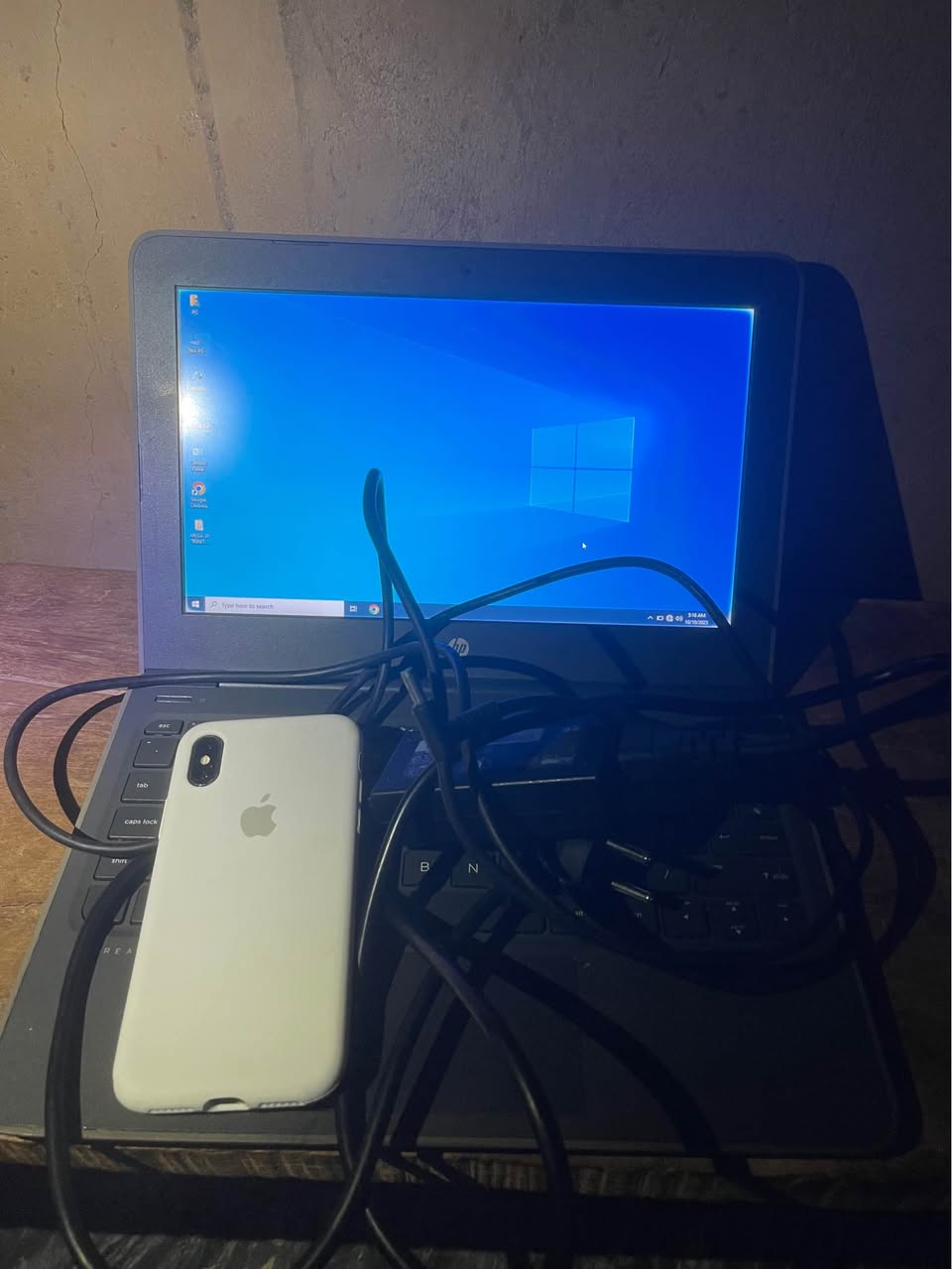 A picture of Selling my iPhone X 64Gb Wifi only and hp laptop