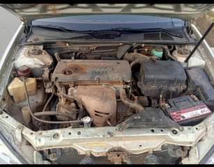 A picture of Toyota Camry 04 engine and gear perfect ok ac chilling