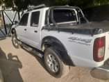 A picture of 2014 Nissan Hardboard White