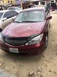 A picture of Toyota Camry 2004 4 plug Painted but not neatly Engine