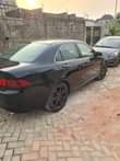 A picture of Acura txs 1 2 2007 and Toyota Camry 2 4