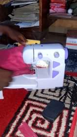 A picture of Cherehani nzuri sana portable umeme na BETRY 0628115806 WhatsApp jipatie