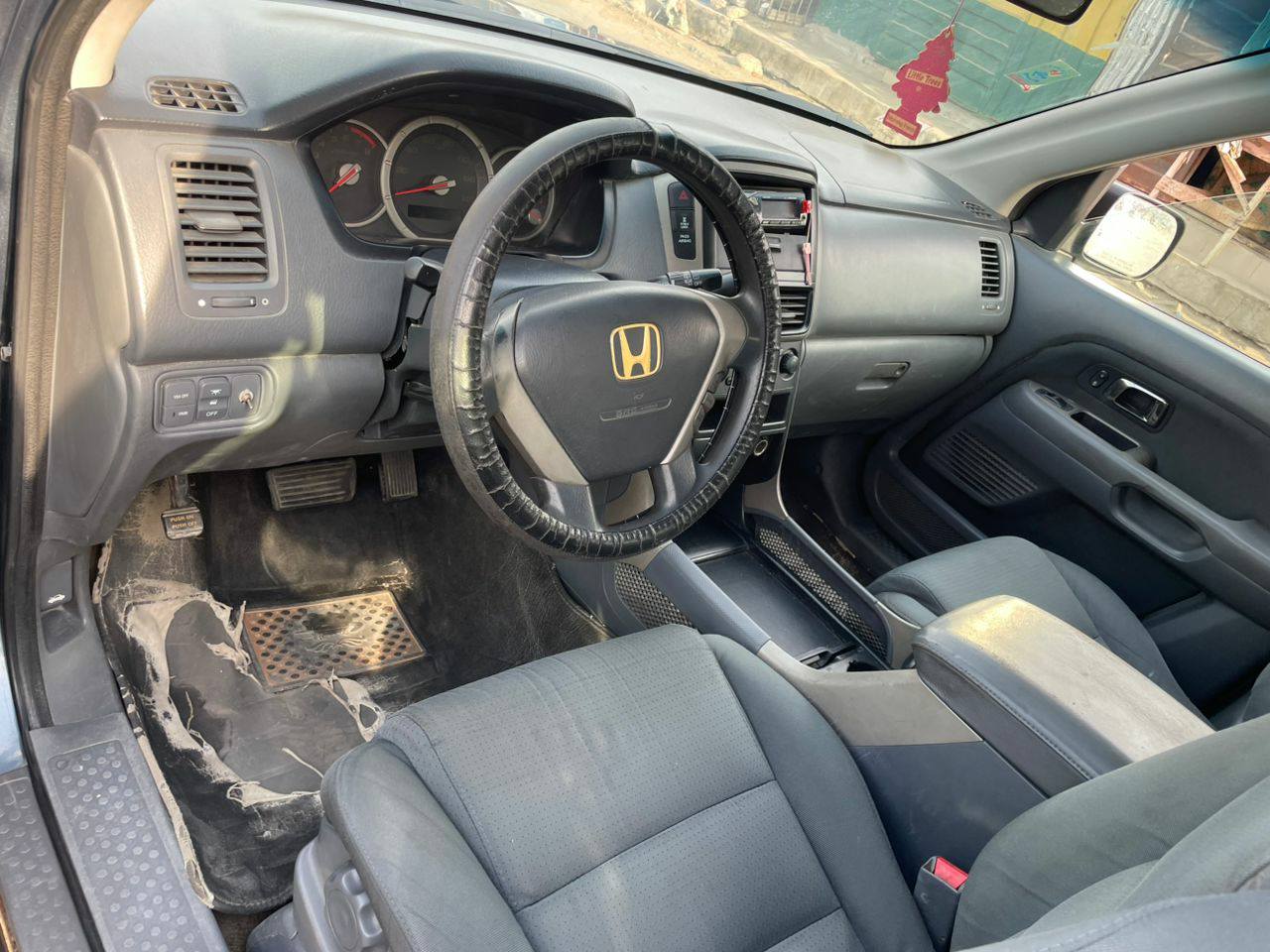 A picture of Honda pilot 2007 model Neatly used Nothing to fix