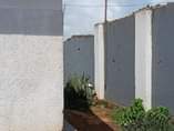 A picture of Nanganda kansanga rd plot starts with tarmac