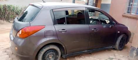 A picture of Nissan tiida on sale 55000 negotiable it needs 2coils and