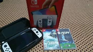 A picture of Used NINTENDO SWITCH OLED ON SALE CALL 0759592534