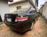 A picture of Clean 2008 Toyota Camry with android screen Absolutely nothing to