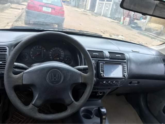 A picture of New Honda Civic just paint half painted engine an gear