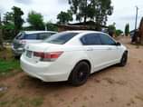 A picture of Honda Accord 2009 neatly used. Engine gear and AC .