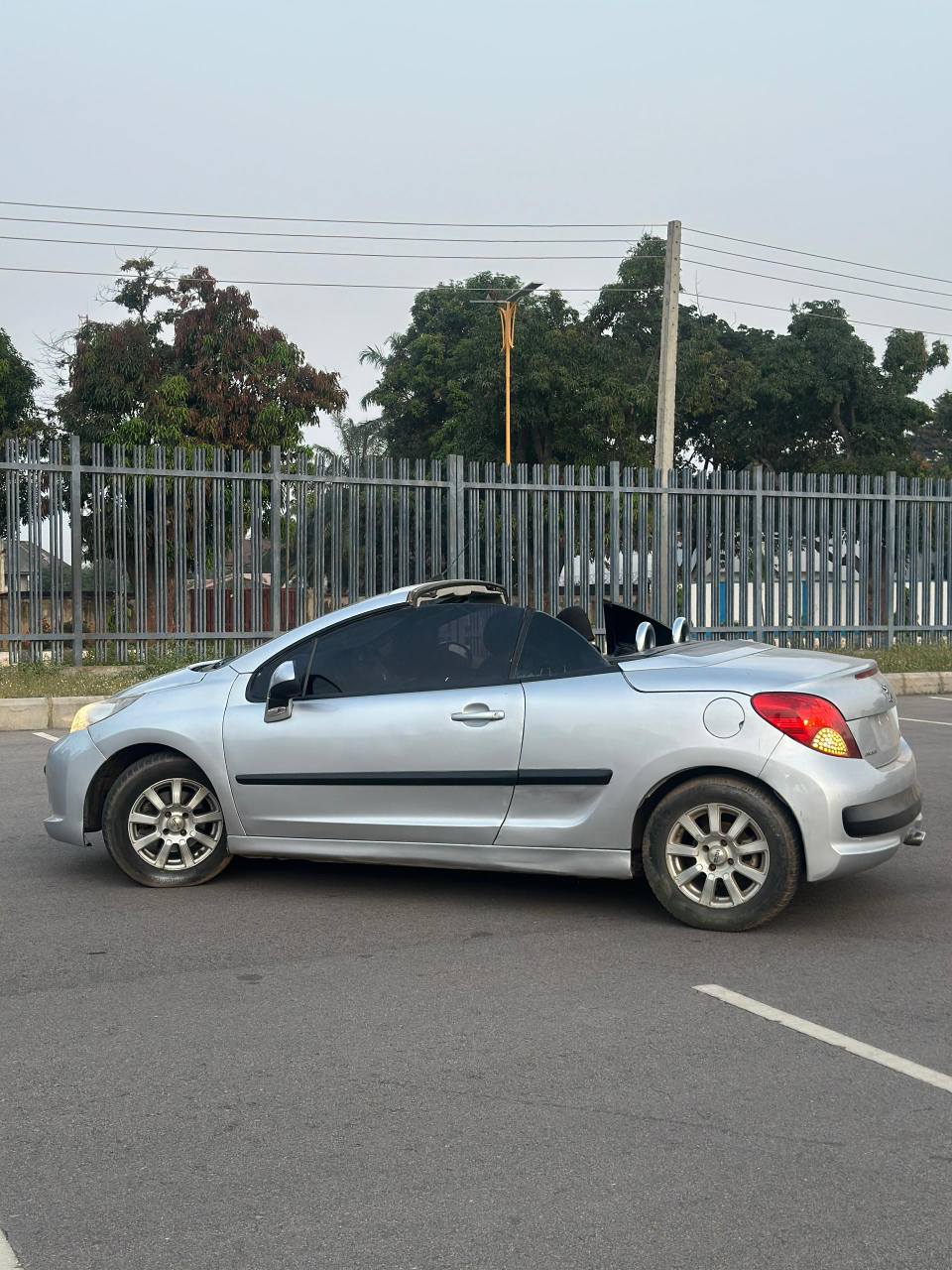A picture of AWOOF DEAL Another banga SUPER CLEAN USED Peugeot 207cc 2009