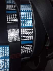 A picture of Fan belt timing belt. Original .