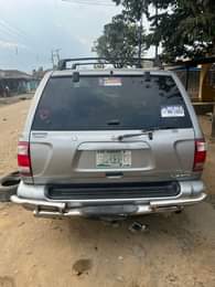 A picture of NISSAN PATHFINDER JEEP. FOUR WHEELS DRIVE. VERY GOOD ENGINE AND